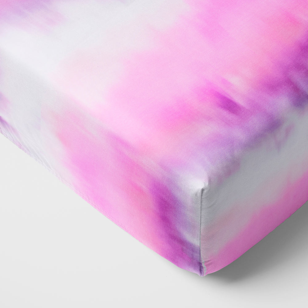Close up of the corner on the Pink Cosmic Mist Fitted Crib Sheet
