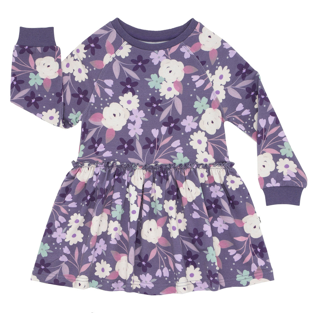 Flat lay image of a Sugar Plum floral drop waist dress