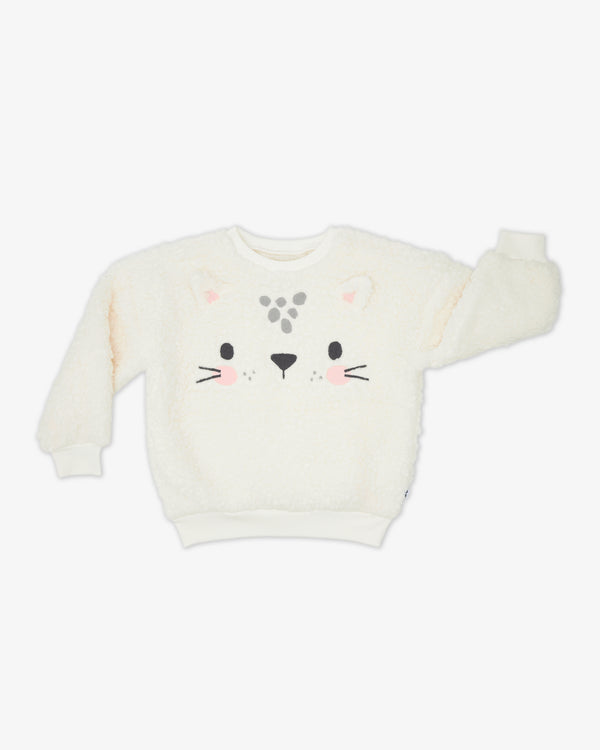 Flat lay of the Leopard Drop Shoulder Crewneck