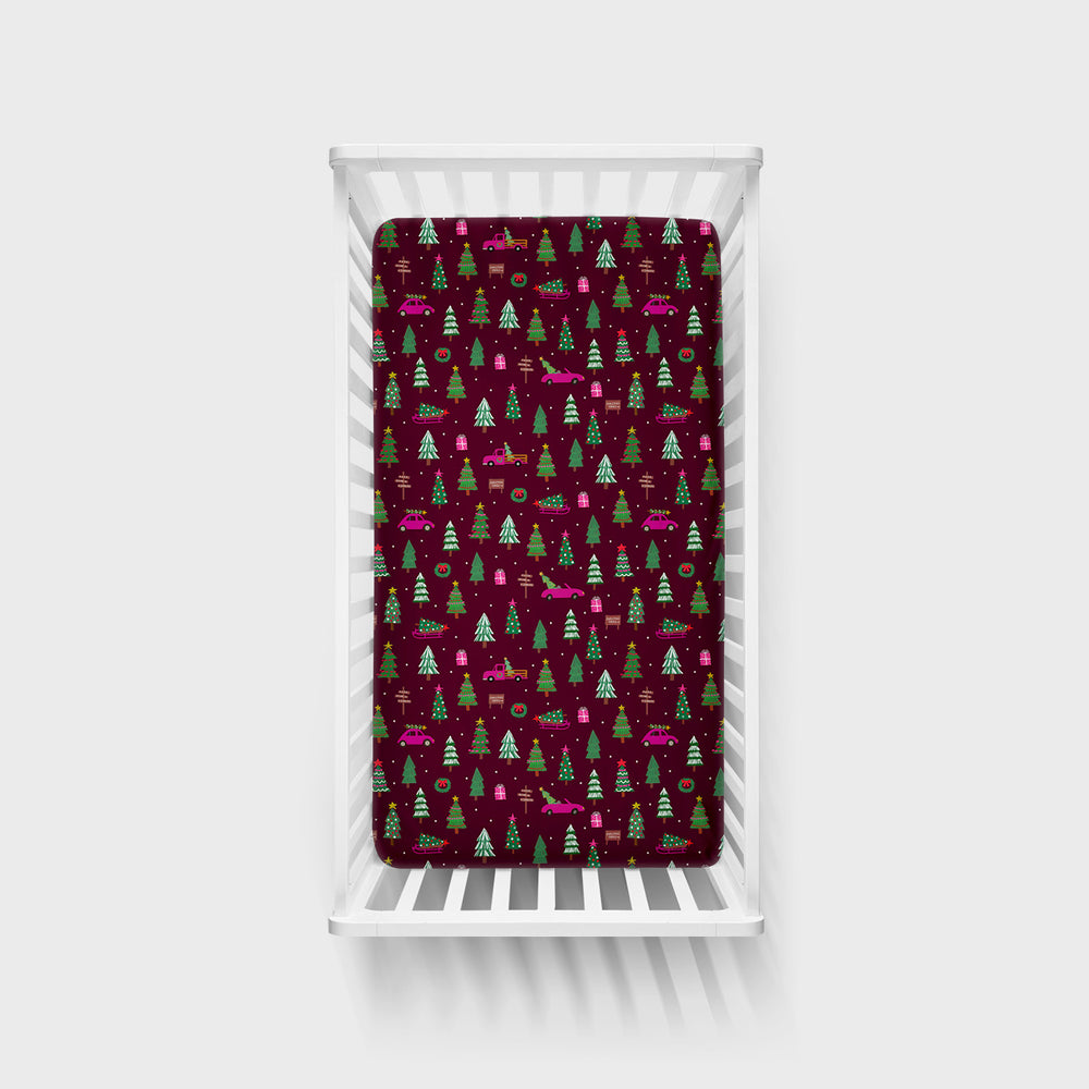 Overhead view of the Cranberry Tree Traffic Fitted Crib Sheet