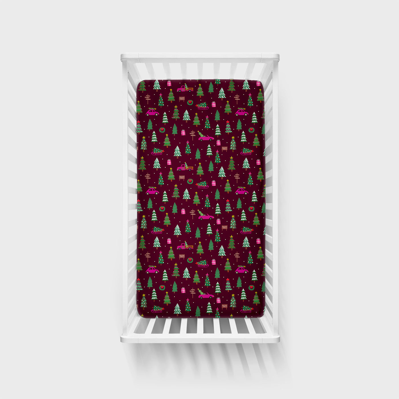 Overhead view of the Cranberry Tree Traffic Fitted Crib Sheet