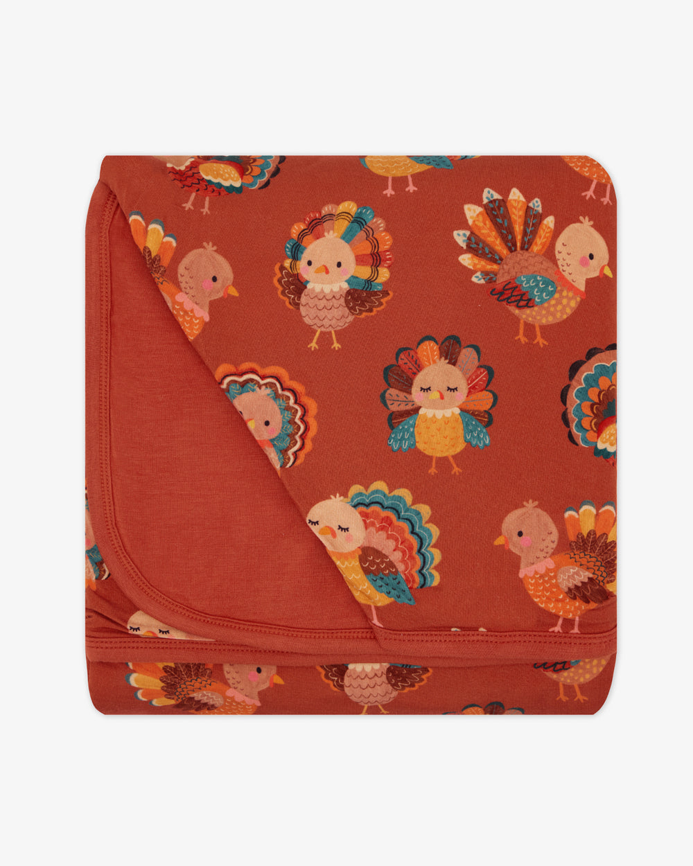 Flat lay of the Grateful Gobbles Large Cloud Blanket®