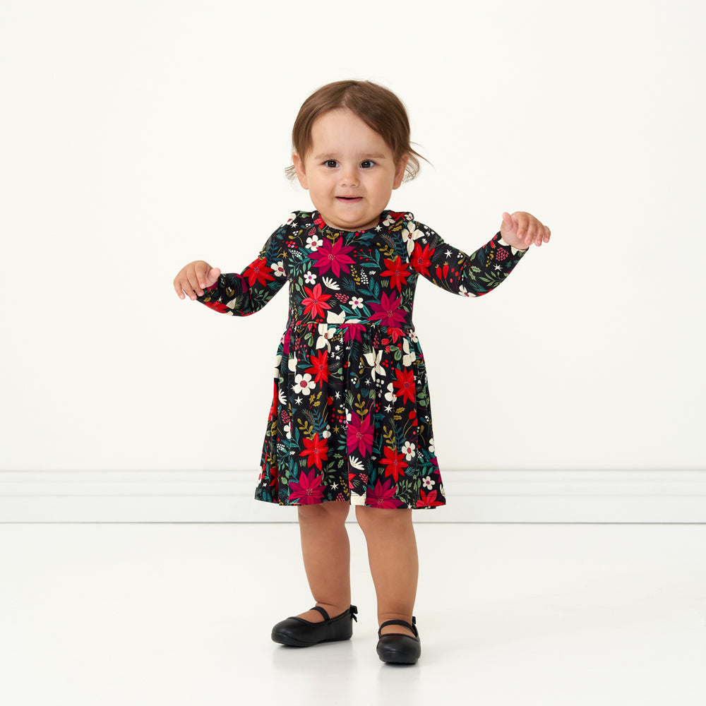 Child wearing a Berry Merry twirl dress with bodysuit