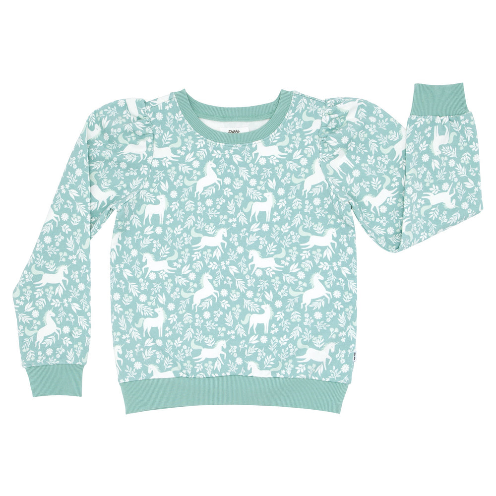 Flat lay image of a Unicorn Garden puff sleeve crewneck