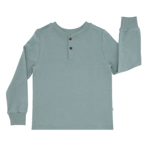 Flat lay image of a Vintage Teal henley tee