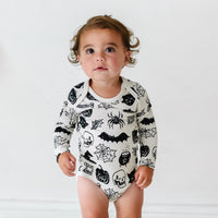 Child wearing a Witches Brew Bodysuit
