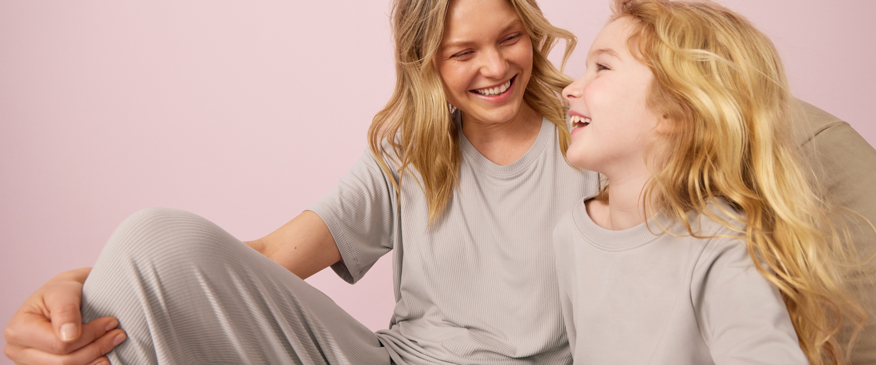 Mother and child in matching loungewear sets