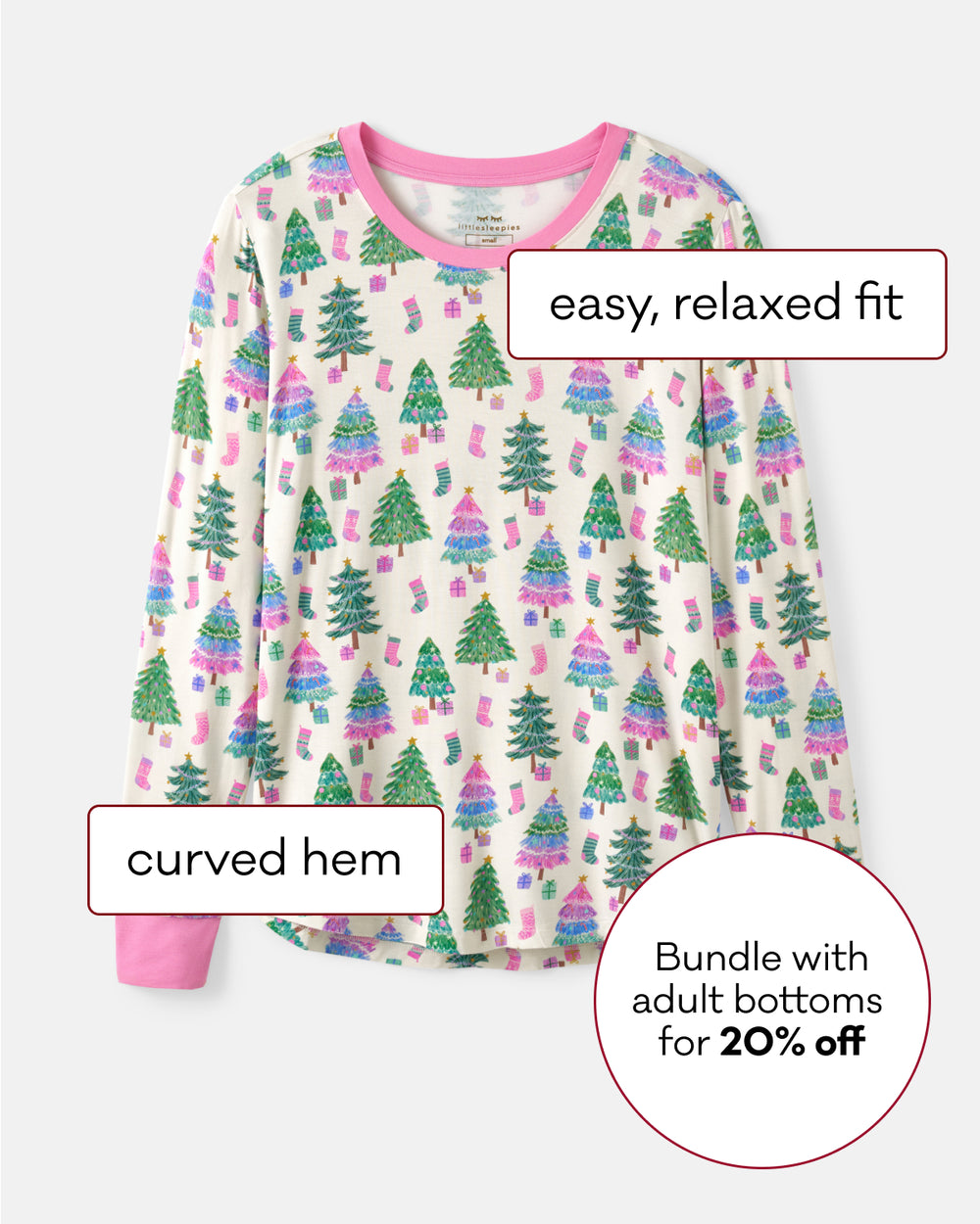 A long-sleeve pajama top with a Christmas tree print on a cream background, featuring pink trim and a pink curved hem. The image includes text callouts highlighting features like 'easy, relaxed fit', 'curved hem', and a promotional offer.