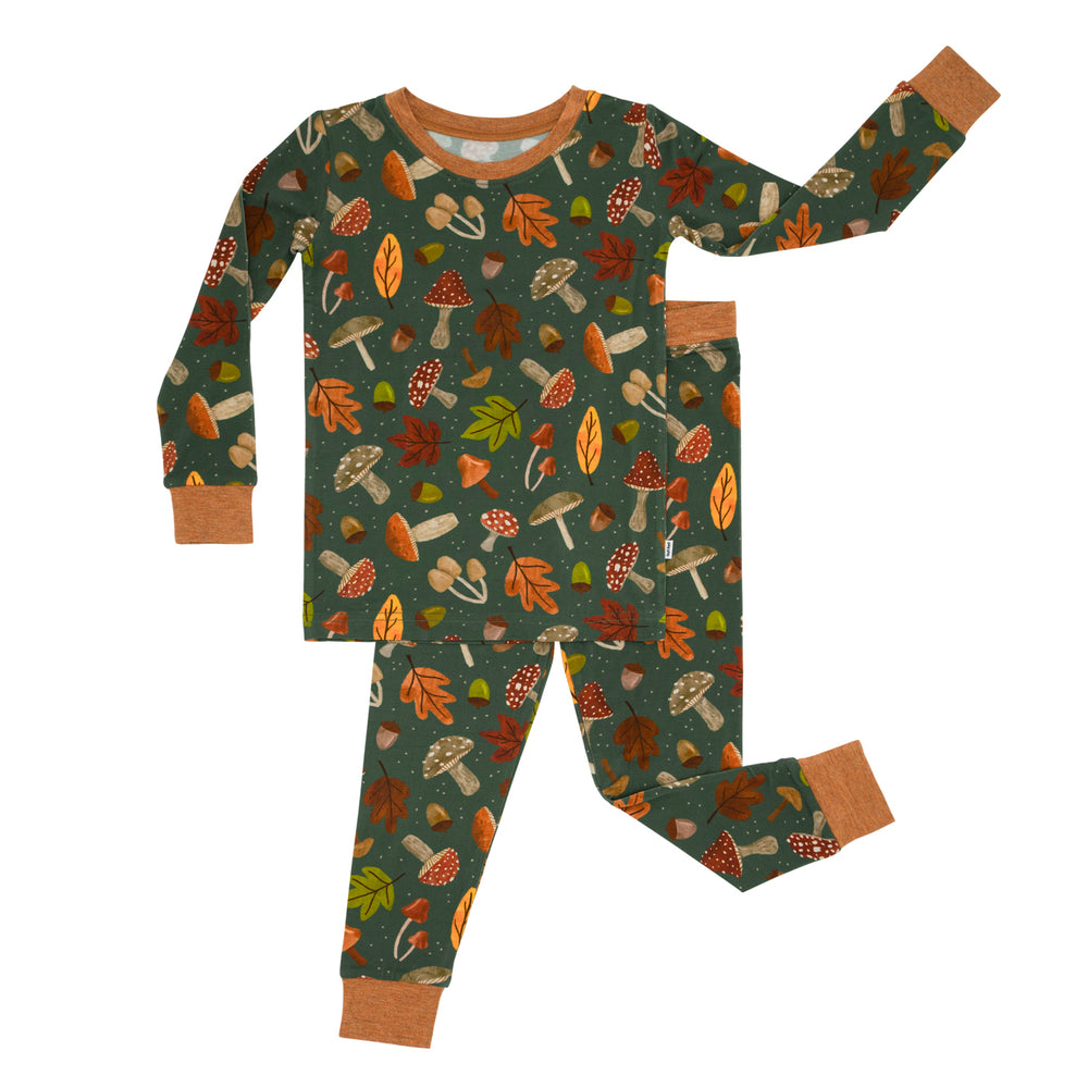 Flat lay image of a Woodland Forest two-piece pajama set