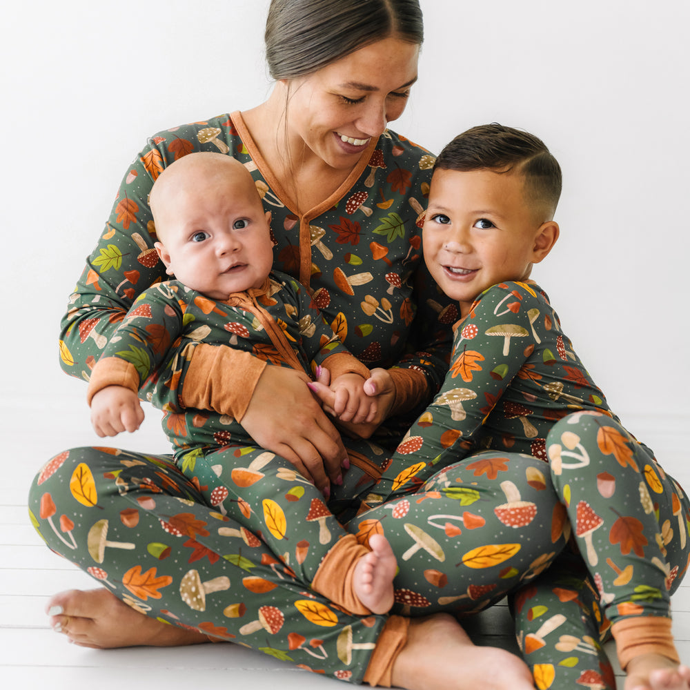 Family wearing matching Woodland Forest pajamas