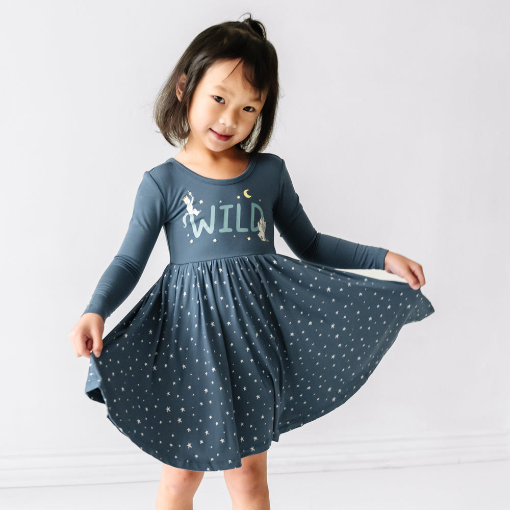 alternate image of a child posing wearing a Where the Wild Things Are twirl dress