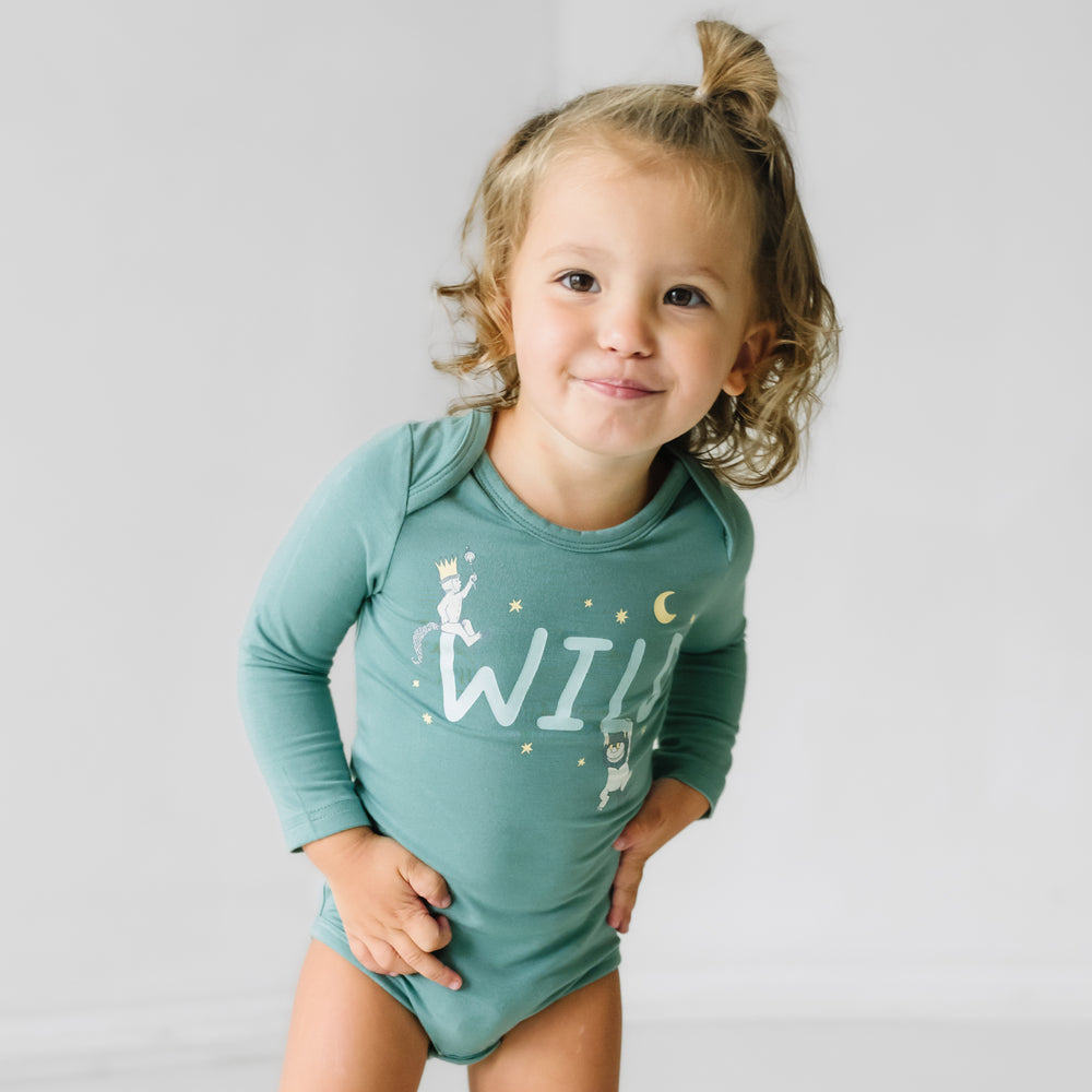 Alternate close up image of a child wearing a Where the Wild Things Are graphic bodysuit