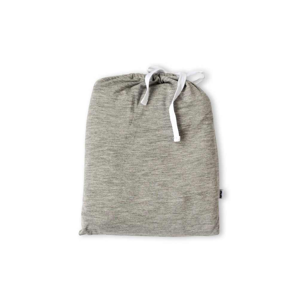 Click to see full screen - Reusable heather gray drawstring bag containing matching infant fitted crib sheet in heather gray 