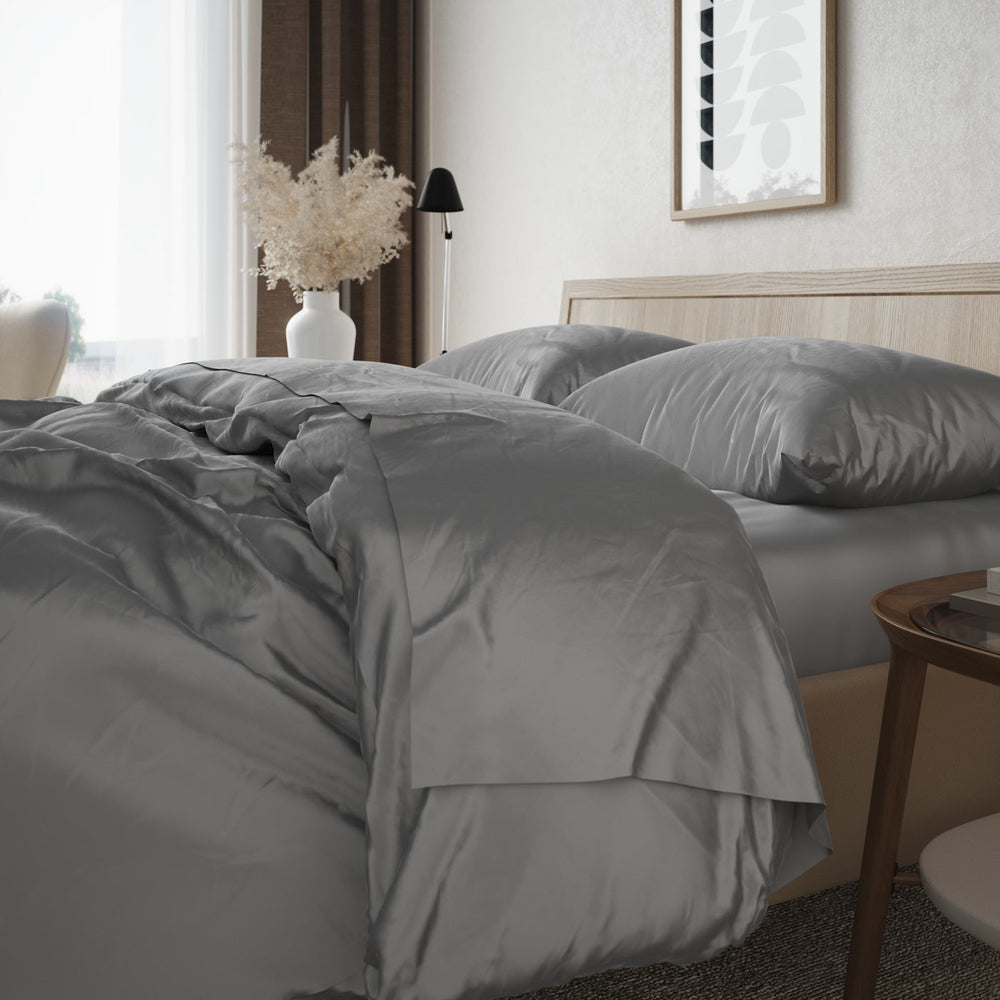 Image of bed turned down with the Bamboo Duvet Cover in Stone