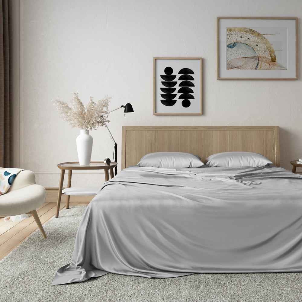 Image of a bed made up with LS Home's Bamboo Sheet Set in Silver