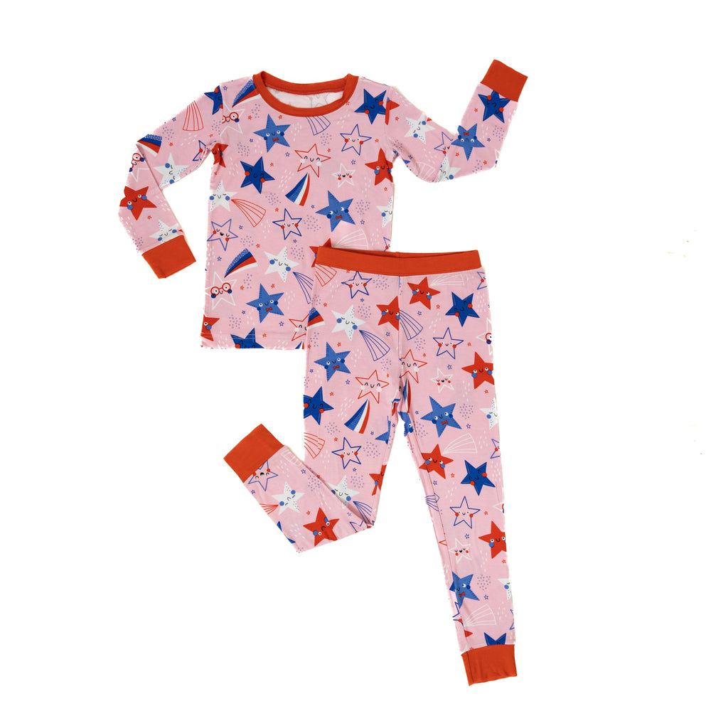 Flat lay image of a Pink Stars and Stripes printed two piece pajama set