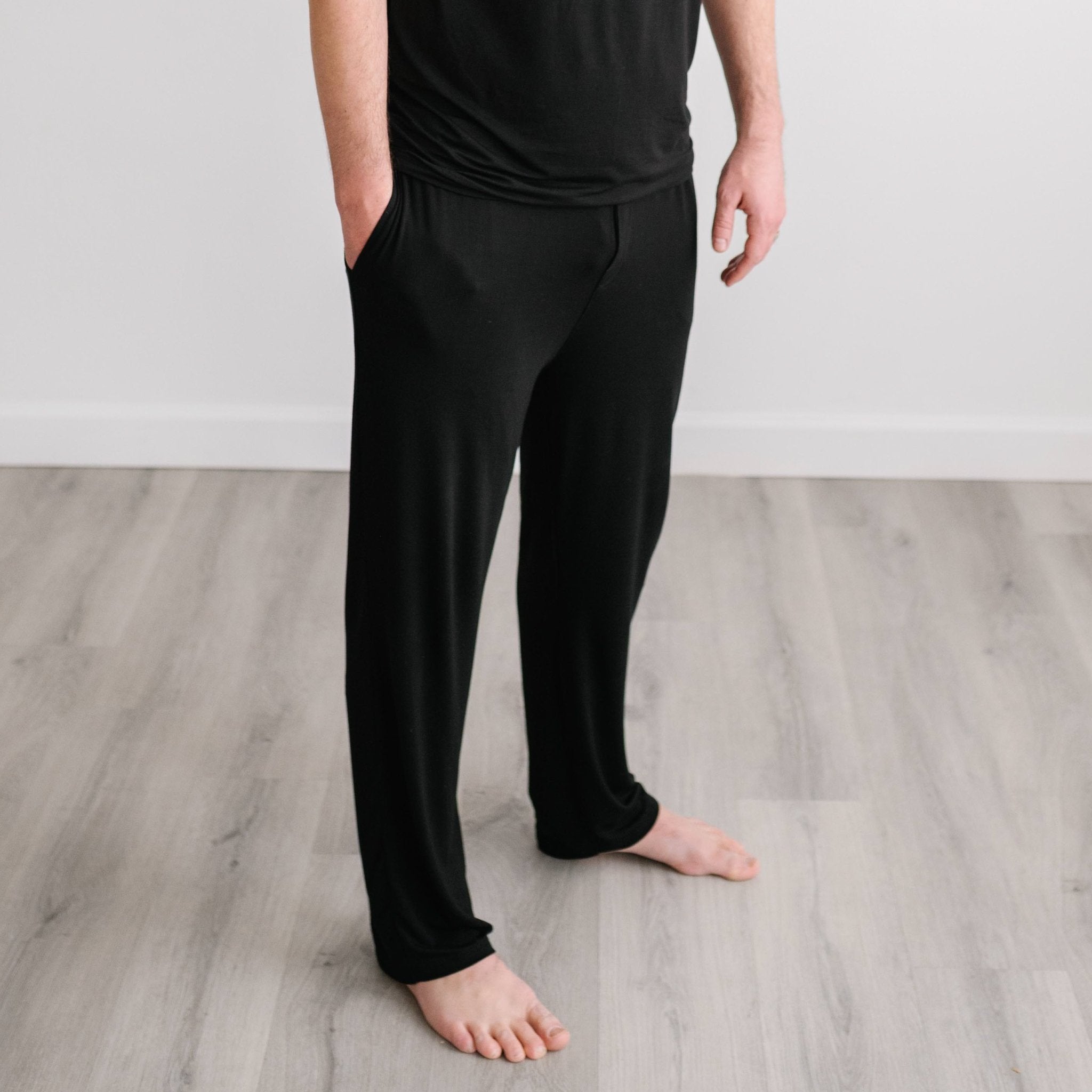 Man wearing the Black Men's Pajama Pants
