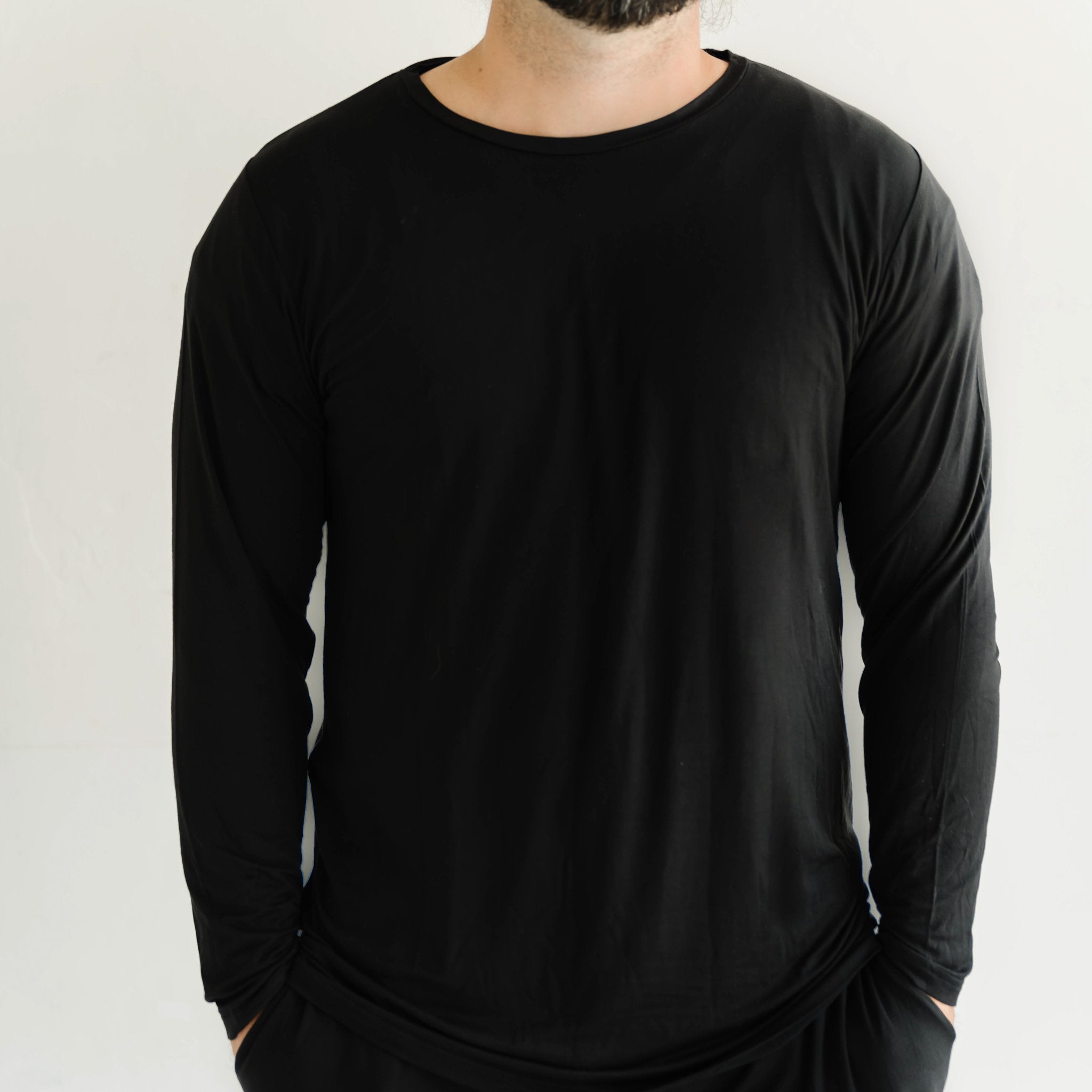 Close up of man wearing the Black Men's Pajama Top