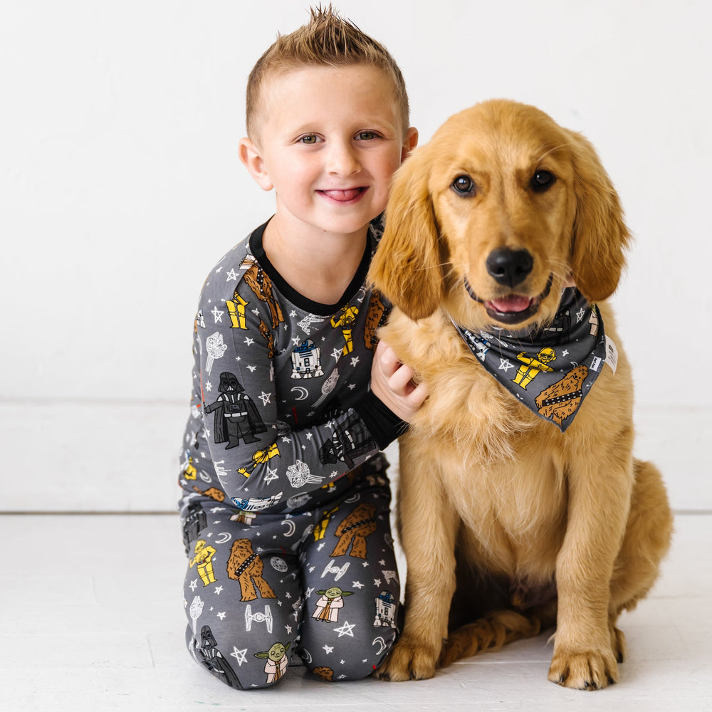 Click to see full screen - Child in Star Wars™ May the Force Be With You Two-Piece Bamboo Viscose Pajama Set and dog in Star Wars™ May the Force Be With You Pet Bandana