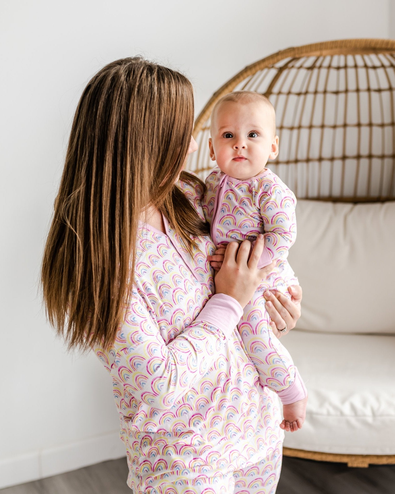 Mother and daughter wearing matching Pastel Rainbows PJs