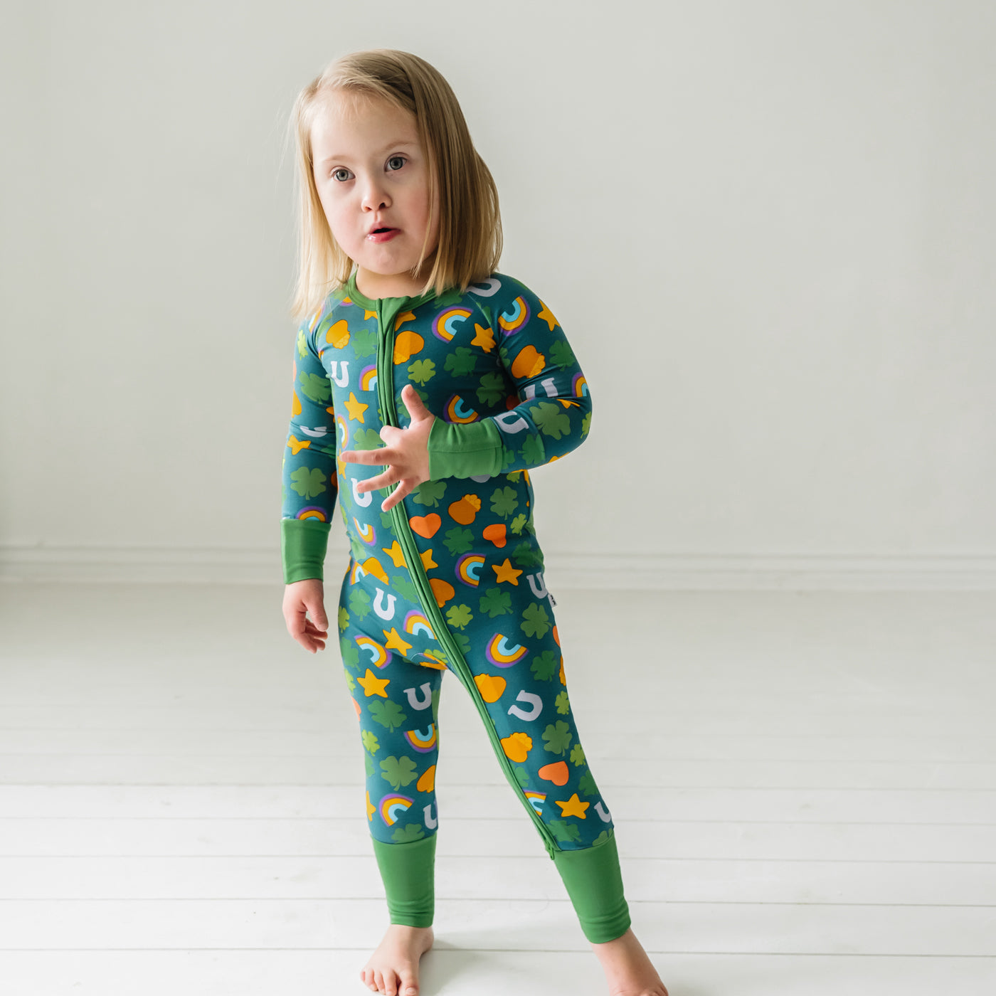 Child wearing a Lucky printed zippy