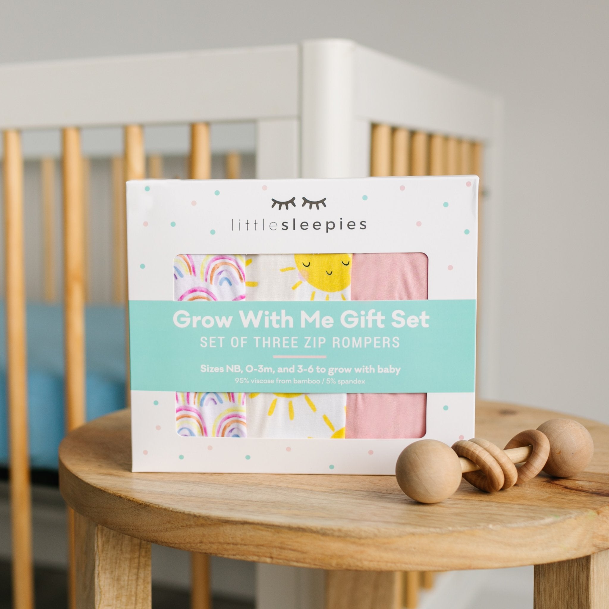 The Pastel Rainbows, Bubblegum & Sunshine Zippy Grow With Me Three Pack Gift Box on a wooden table