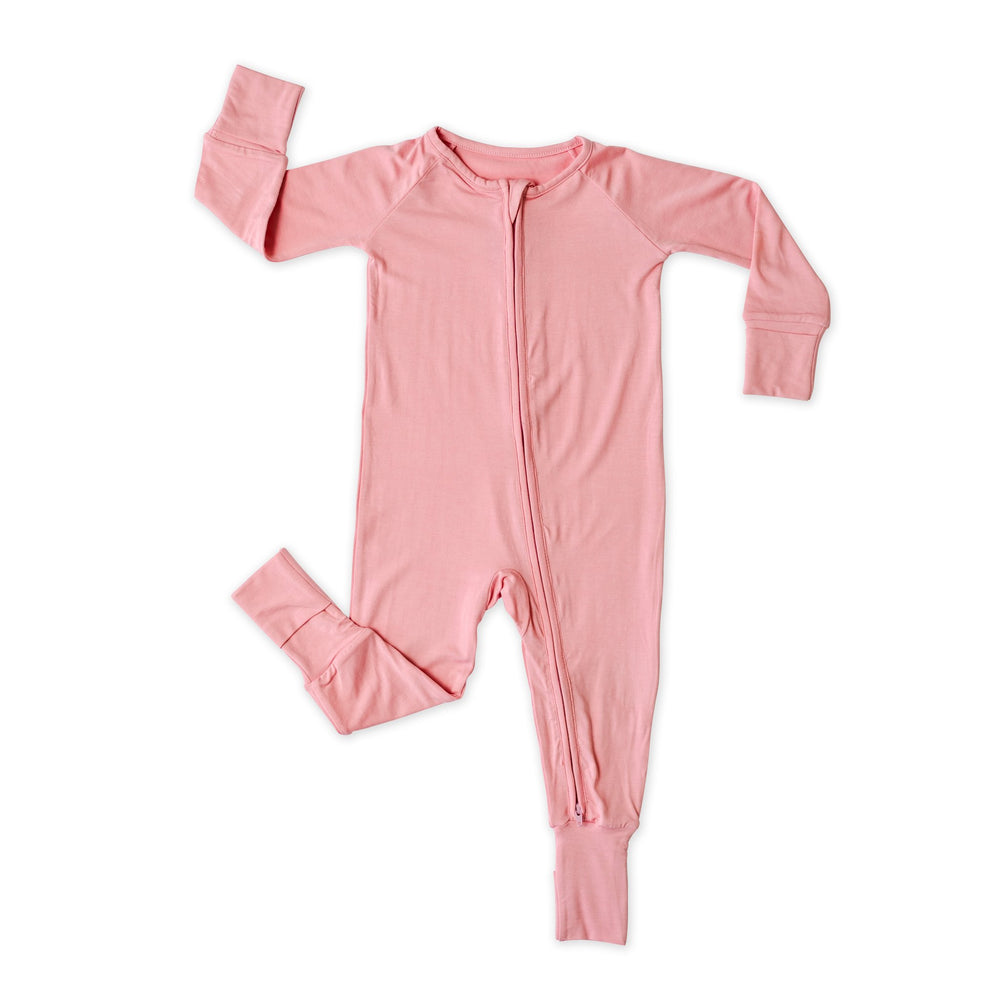 Click to see full screen - Flat lay image of zip up romper in solid bubblegum pink